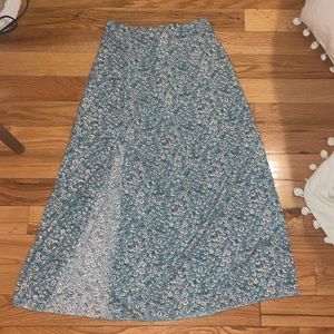 Long skirt has flowers on it